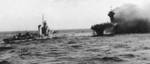 Explosion aboard USS Lexington, 8 May 1942, photo 2 of 2; note USS Hammann nearby; seen from cruiser USS Minneapolis