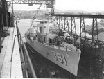 Henley ready for launching, Mare Island Navy Yard, California, United States, 12 Jan 1937; note Preston partially visible through the crane rails, at right