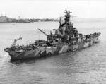 USS Indiana off Norfolk, Virginia, United States, 8 Sep 1942, photo 2 of 5; note crews slung over the stern completing the paint job of the hull