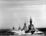 Warships Indiana, Massachusetts, Chicago, and Quincy steaming in a column off Kamaishi, Iwate, Japan, 14 Jul 1945