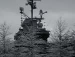 Superstructure of museum ship Intrepid above treetops, New York City, New York, United States, 21 Feb 2011
