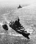 USS Missouri leading USS Iowa into Tokyo Bay, Japan, 30 Aug 1945, photo 1 of 2; note destroyer USS Nicholas in escort