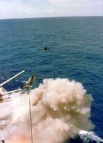 Pieces flying out the No. 2 turret of USS Iowa during the accidental explosion, 19 Apr 1989