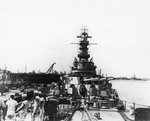 USS Iowa at the New York Navy Yard, New York, United States, 9 Jul 1943; note carrier in background