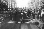 Rear Admiral Clark Woodward driving the first rivet for battleship Iowa at the keel laying ceremony, New York Navy Yard, New York, United States, 27 Jun 1940