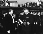 Commissioning ceremony of Johnston, Seattle, Washington, United States, 27 Oct 1943, photo 2 of 2; Lieutenant Commander Evans in foreground