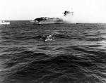 A whaleboat evacuating men from USS Lexington, 8 May 1942, photo 1 of 2