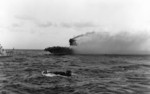 A whaleboat evacuating men from USS Lexington, 8 May 1942, photo 2 of 2