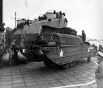 DUKW loaded with supplies for supplying the Normandy beachhead boarding LST-543, England, United Kingdom, Jun 1944, photo 2 of 2