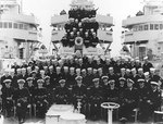 Officers and crew of destroyer Mugford, with Lieutenant Commander Arleigh A. Burke in center, circa 1939-1940