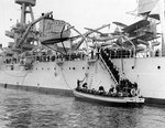 Midshipmen and sailors boarding a 50-foot motor launch from New York, during the summer 1940 US Naval Academy Midshipmen