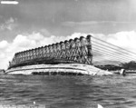 Righting Oklahoma during her salvage at Pearl Harbor, 8 Mar 1943
