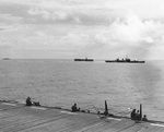Cruiser Phoenix screening escort carriers off Leyte, Philippine Islands, 30 Oct 1944