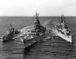 US Navy destroyer Buck, battleship Wisconsin, and heavy cruiser Saint Paul off Korea, 22 Feb 1952, photo 2 of 2