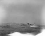 USS Saint Paul bombarding communist positions near Hungnam, South Hamgyong Province, Korea, Dec 1950