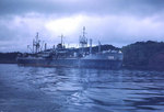 USS Sanborn (APA-193) in harbor at dawn or dusk, circa late-1944 or 1945, photo 1 of 4