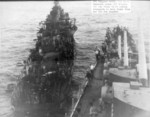 USS San Diego assisting USS Haggard after the latter was hit by Japanese special attack, off Okinawa, Japan, 29 Apr 1945