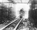 San Diego sliding down her shipways during her launching at the Bethlehem Steel Company shipyard, Quincy, Massachusetts, United States, 26 Jul 1941
