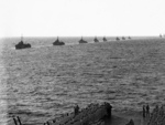 British Eastern Fleet destroyers providing honorary escort to USS Saratoga (foreground) as the US carrier departed Indian Ocean, 18 May 1944