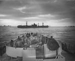 View of SS G. Harrison Smith from the stern of United States Coast Guard cutter Spencer, North Atlantic, 500 nautical miles WSW of Ireland, 17 Apr 1943