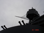 View up superstructure of USS Texas, 2007; note the muzzle of 40mm anti-aircraft guns, the foremast, and the spotters