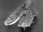 USS Ticonderoga receiving fuel from USS Manatee, 15 Jul 1965