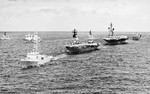 HMCS Gatineau, HMAS Melbourne, USS Ticonderoga, and other ships during the RIMPAC 72 exercise, 1972; seen in Dec 1972 edition of US Navy publication Naval Aviation News
