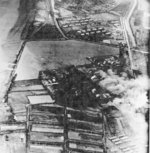 Kaneka Soda Company chemical plant under attack by Air Group 80 aircraft from USS Ticonderoga, Tainan, Taiwan, 15 Jan 1945, photo 2 of 2