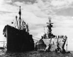 Battleship Washington alongside AR-4 Vestal for initial repairs after colliding with battleship Indiana, 1 Feb 1944