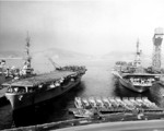 USS Sicily and USS Yorktown at Yokosuka Naval Base, Japan, early Feb 1954; note AF Guardian aircraft on Sicily and AD Skyraider aircraft on Yorktown
