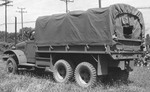 Rear view of an International Harvester M-5H-6 2 1/2-ton 6x6 transport truck with 12-ft. bed, built to the same specifications as the GMC CCKW but in much fewer numbers; Holabird, Mayland, United States, date unknown