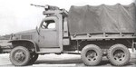 Early GMC CCKW 2 1/2-ton 6x6 closed cab short wheel base transport with winch and optional gun ring, date unknown