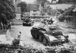 Cruiser Mk IV tanks of 5th Royal Tank Regiment of 3rd Armoured Brigade of British 1st Armoured Division in a village in Surrey County, England, United Kingdom, Jul 1940, photo 2 of 2