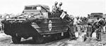 DUKW of US 7th Army being loaded with gasoline jerrycans for a quick transfer across the Rhine, circa Apr 1945