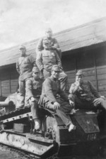 Japanese troops on top of a FT light tank, circa 1940s