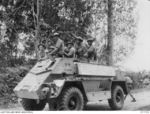 Australian troops in an Indian Pattern Carrier Mk II vehicle in Malaya, 9 Mar 1942