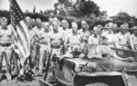 Men of US 5th Marine Division with mascot lion Roscoe, circa 1945