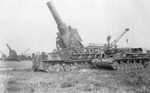 Three Karl-Gerät self-propelled howitzers preparing to fire at Warsaw, Poland, Aug-Sep 1944; note converted Panzer IV ammunition carrier