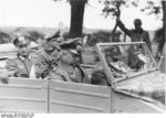 Field Marshal Walter Model and Colonel Wilk traveling in a Kübelwagen to visit the 246th Volksgrenadier Division in Aachen, Germany, 9 Oct 1944
