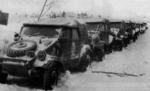 Line of Kübelwagen vehicles parked in the snow, date unknown