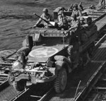American M3 Half-track vehicle crossing the Seine River in France, 1944