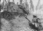 Australian troops and M3 General Stuart light tank fighting near Buna, New Guinea, Jan 1943