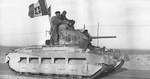 Matilda tank en route into Tobruk, Libya, 24 Jan 1941; note British soldiers displaying a captured Italian flag