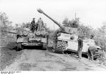 Camouflaged German Army Sturmpanzer assault gun and Tiger I heavy tank at Nettuno, Italy, Mar 1944