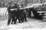 German soldiers removing the gun barrel from a dismantled Tiger I tank turret, Poland, summer 1944