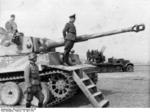 German Waffen-SS General Walter Krüger with a Tiger I heavy tank and an anti-aircraft gun vehicle of his 2nd SS Panzer Division 