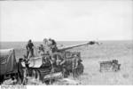 German tank crew transferring rounds of ammunition into a Tiger I heavy tank, near Kursk, Russia, summer 1943, photo 1 of 5