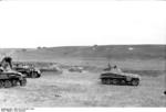SdKfz. 250, SdKfz. 250/4, and SdKfz. 251 halftrack vehicles with Panzer II tanks in Southern Russia, 21 Jun 1942