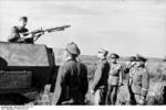 German demonstration of SdKfz. 251 halftrack for Romanian officers, Romania, 21 Jun 1944; note MG34 machine gun mounted on vehicle