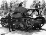 Soviet officers inspecting a captured Finnish T-26 light tank, Finland, circa 1944; this tank might had been captured from the Soviets by Finnish forces during the Winter War of 1939-1940